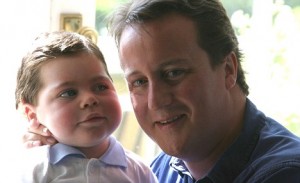 David Cameron with his son Ivan at their country home, Britain  - 16 May 2004